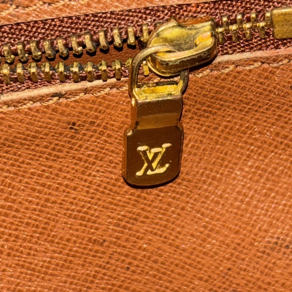 LOUIS VUITTON Monogram Marly
Dragonne GM Clutch Bag
Auth with COA - Picture 13 of 15